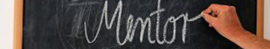 The word Mentor written on a chalk board